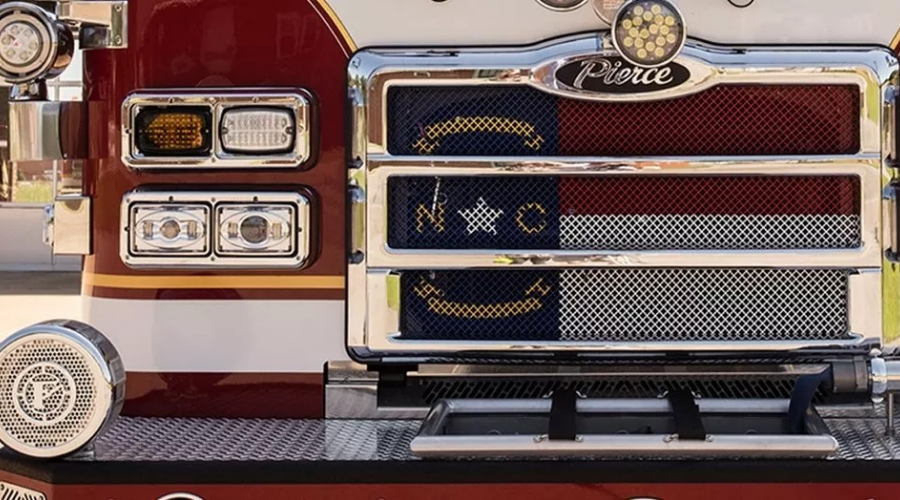 Close up shot of NC fire engine displaying NC flag painted on the grill.