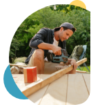 Man repairing his deck thanks to a Civic HELOC.