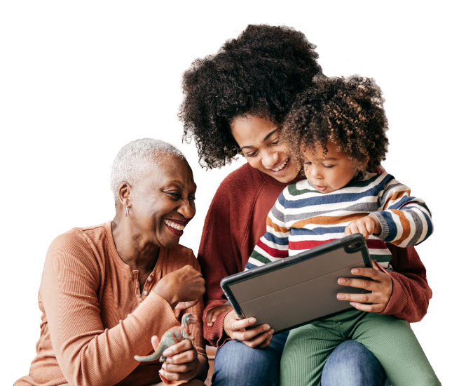 A mother sits with her son on her lap, sharing the Civic NCUA Share Insurance coverage page on a tablet with the grandmother.