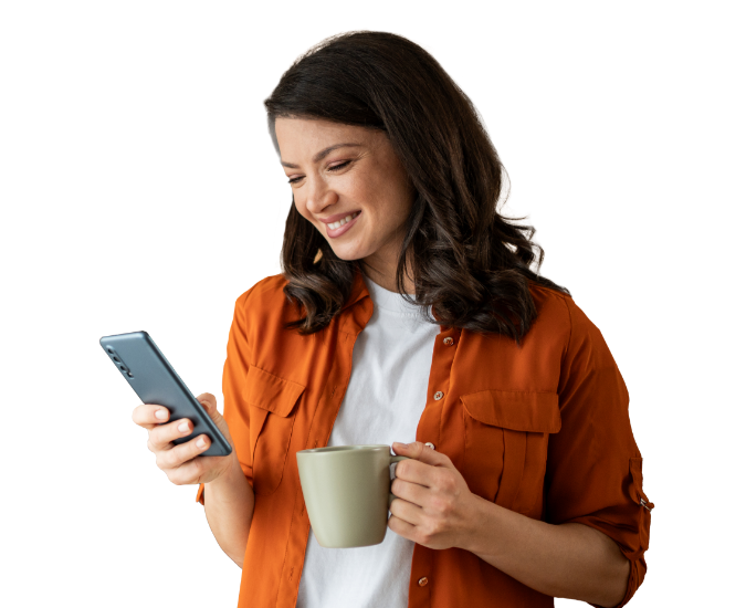 A woman enjoying her morning cup of coffee while easily and conveniently transferring funds using the Civic mobile app.