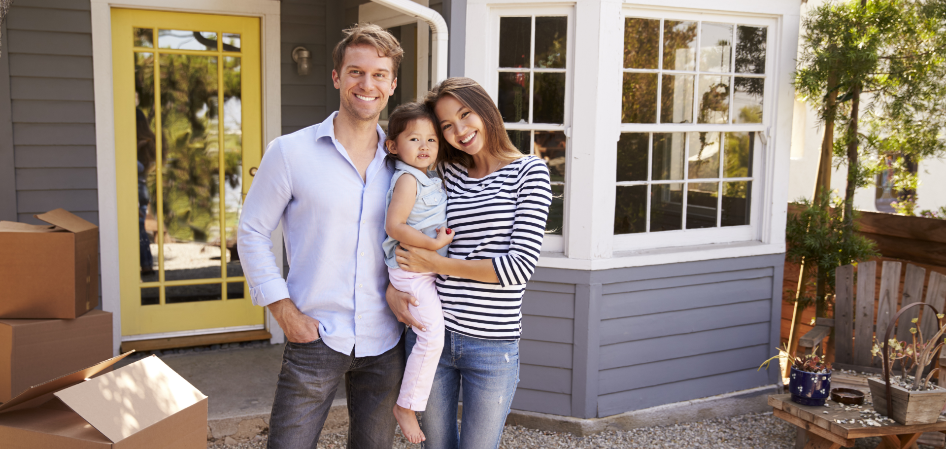 First-time homebuyer family moving into new home purchased with a Civic mortgage.