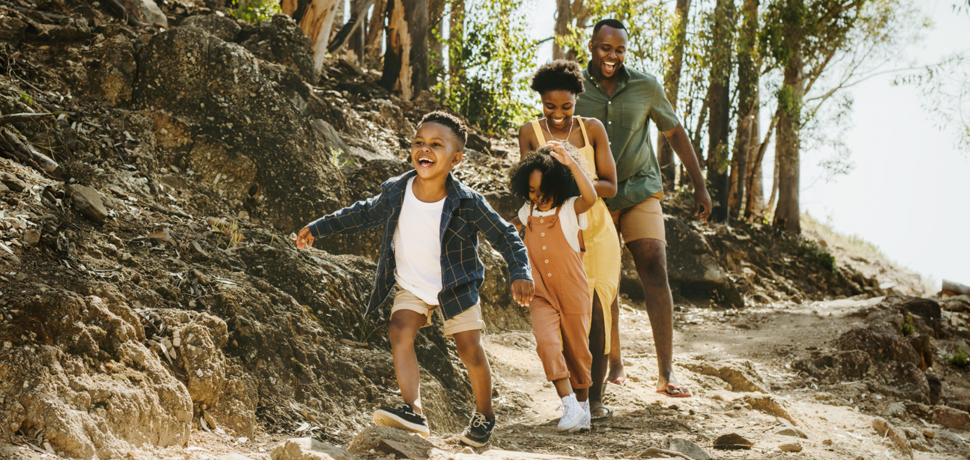 A family of four hiking the Carolina trails, confident that their Civic Savings Account is growing while they enjoy life.
