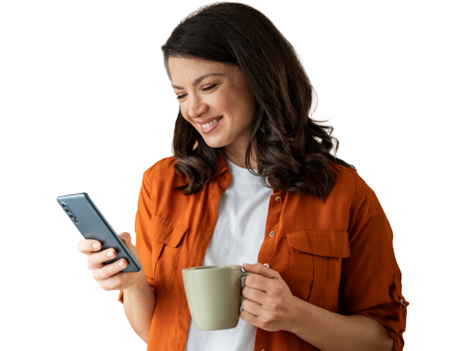 A woman enjoying her morning cup of coffee while easily and conveniently transferring funds using the Civic mobile app.