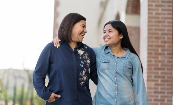 Mother and daughter planning college future using a Civic personal line of credit.