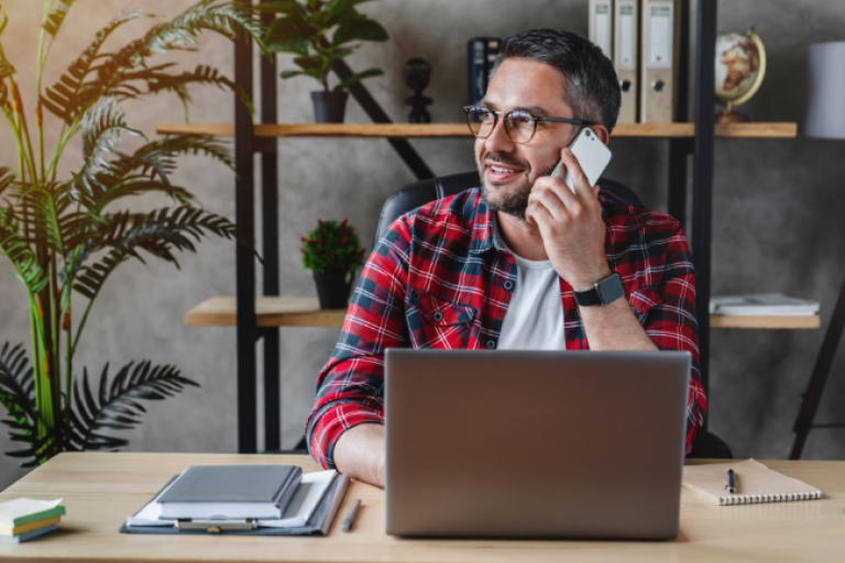 Small business owner feeling great after seeing his Business Choice Certificate earning dividends and growing.