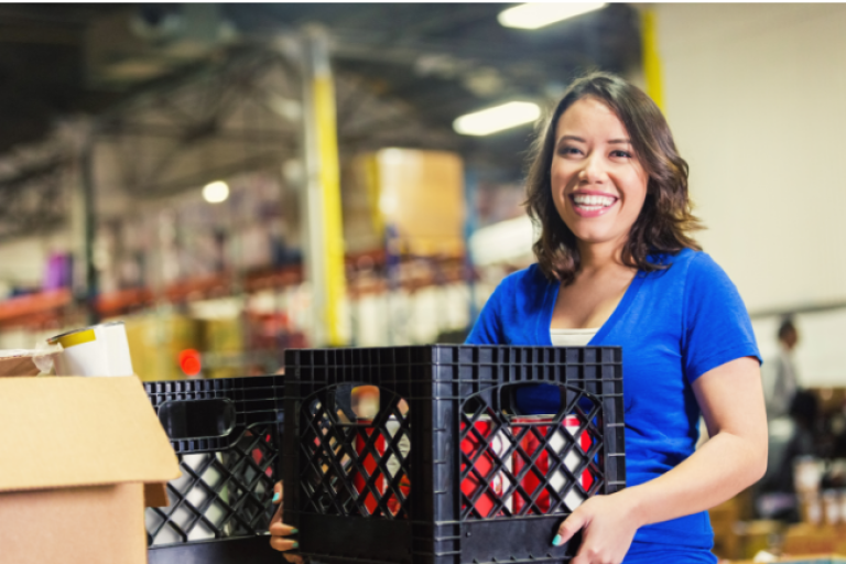 Nonprofit organizer restocking supplies for the organization, supported by the Civic Nonprofit Money Market Account to grow savings faster.