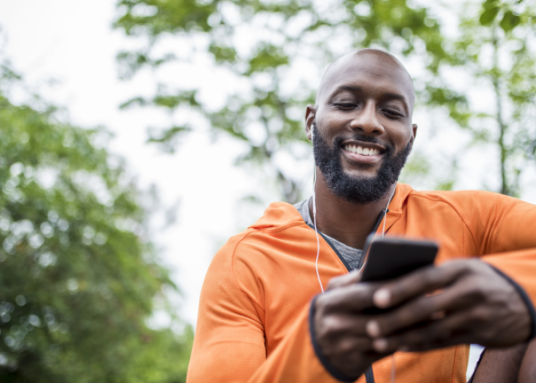 A man checks the deposit of his recently approved Personal Loan through the Civic app on his cellphone.