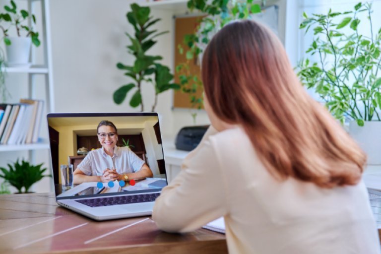 A civic member joins a virtual meeting with the Civic Recovery Assistance team for support in overcoming financial hardship.