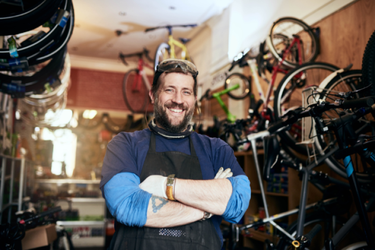 Bike shop owner satisfied with his Civic SEP IRA savings account.