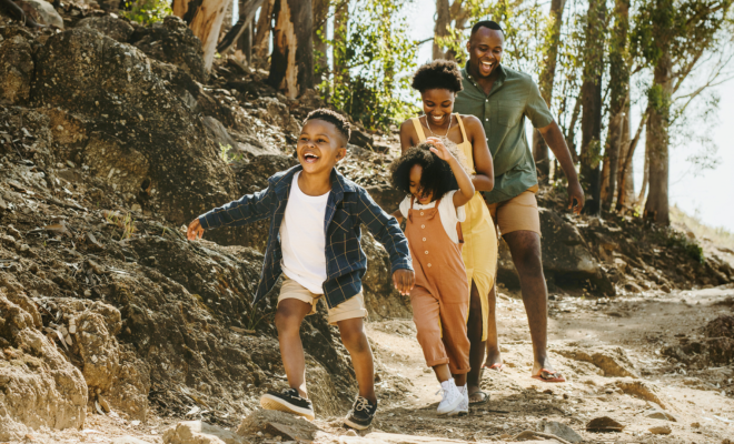 A family of four hiking the Carolina trails, confident that their Civic Savings Account is growing while they enjoy life.